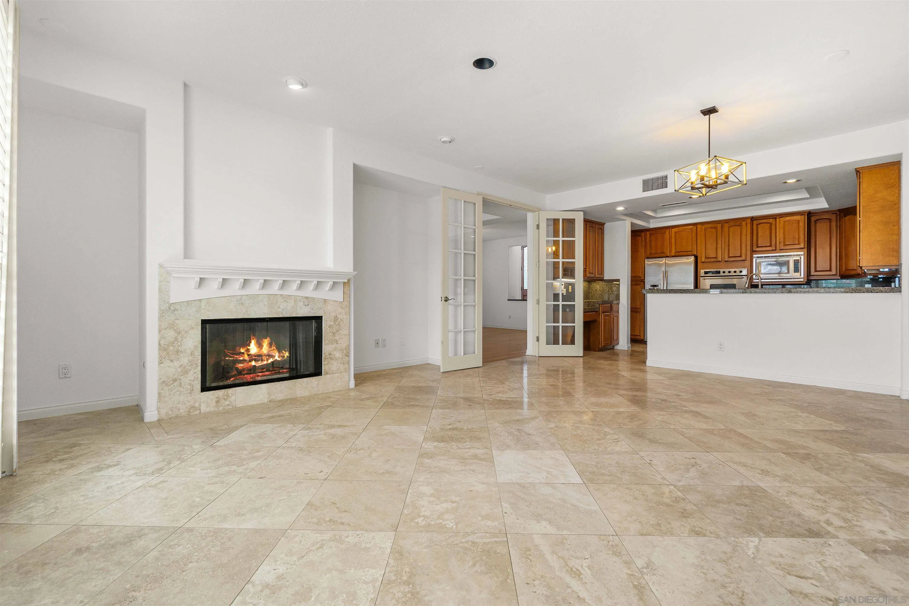 1355 Caminito Balada La Jolla, CA 92037 - Photo 12 of 31 a view of an empty room with a fireplace