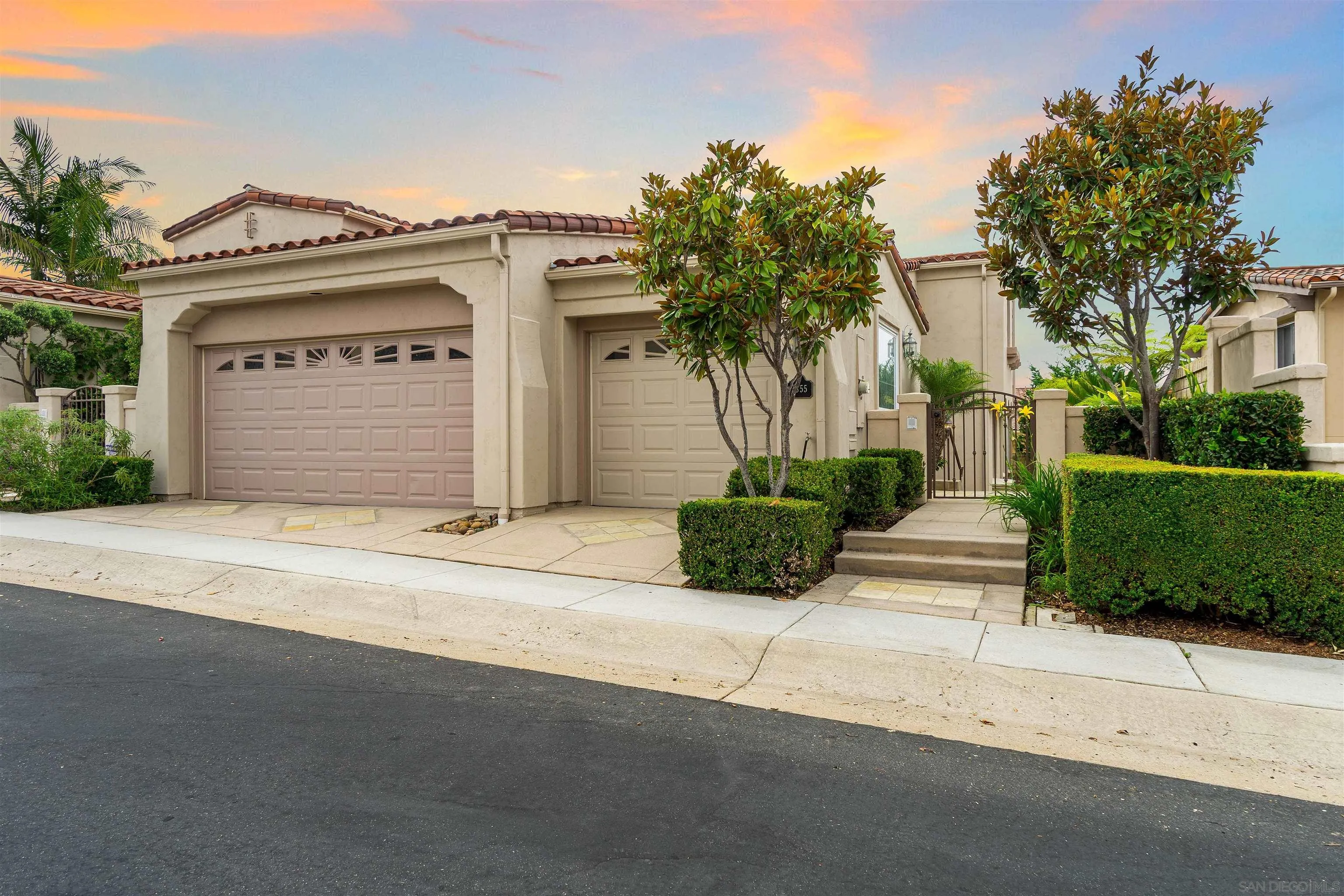 1355 Caminito Balada La Jolla, CA 92037 - Photo 2 of 31 front view of a house with a garden