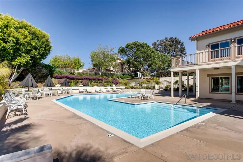 1355 Caminito Balada La Jolla, CA 92037 - Photo 29 of 31 a view of a swimming pool with lounge chairs