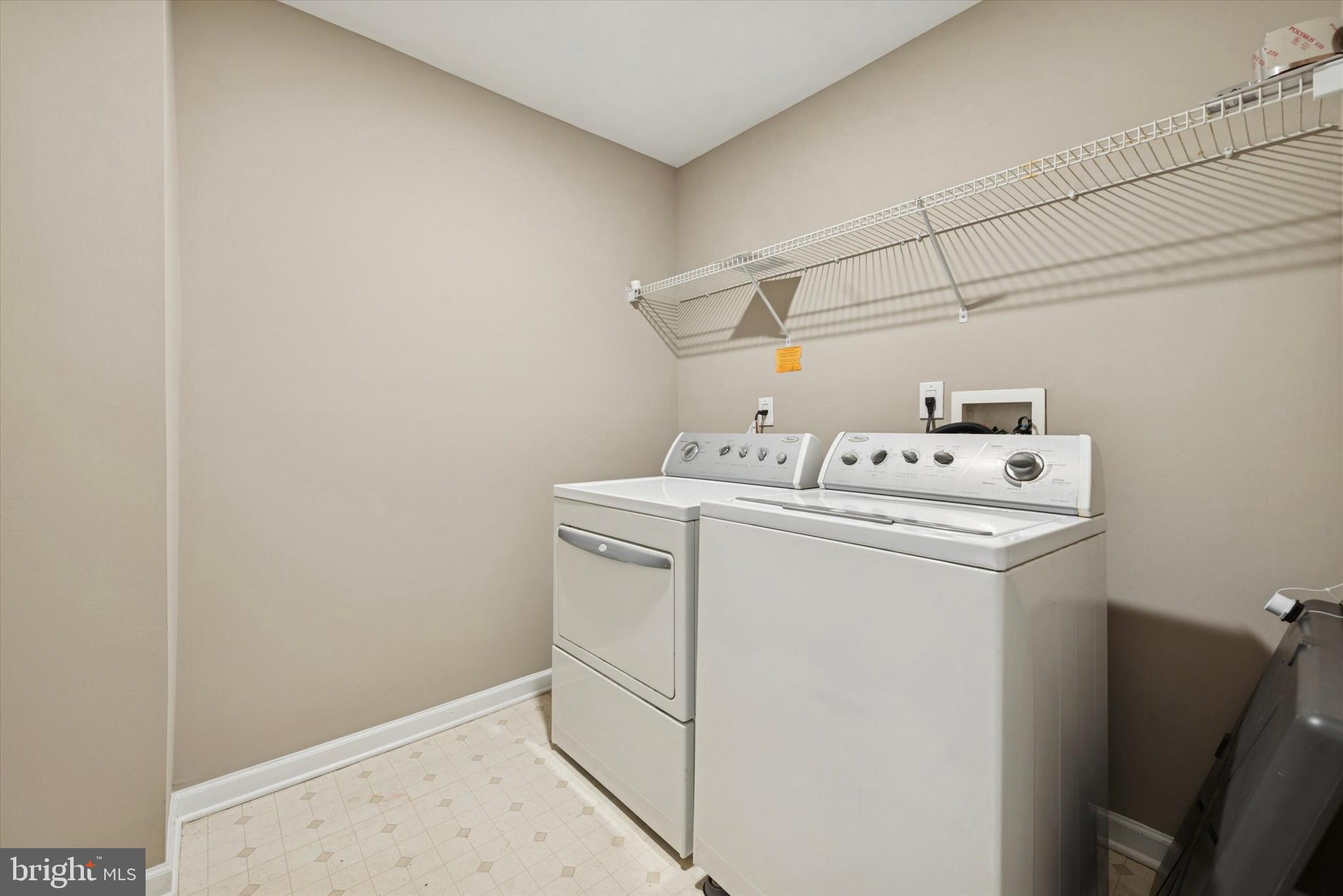 79 Granite Lane, Unit 2 Chester Springs, PA 19425 - Photo 11 of 15 a utility room with dryer and washer