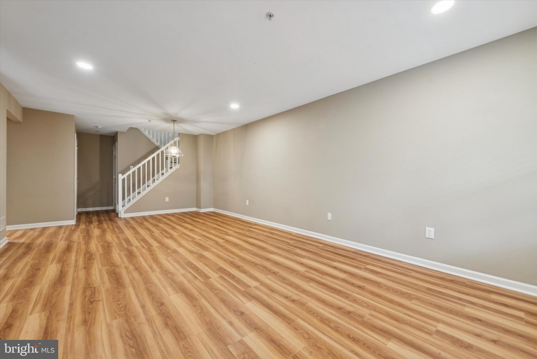 79 Granite Lane, Unit 2 Chester Springs, PA 19425 - Photo 12 of 15 a view of an empty room with wooden floor