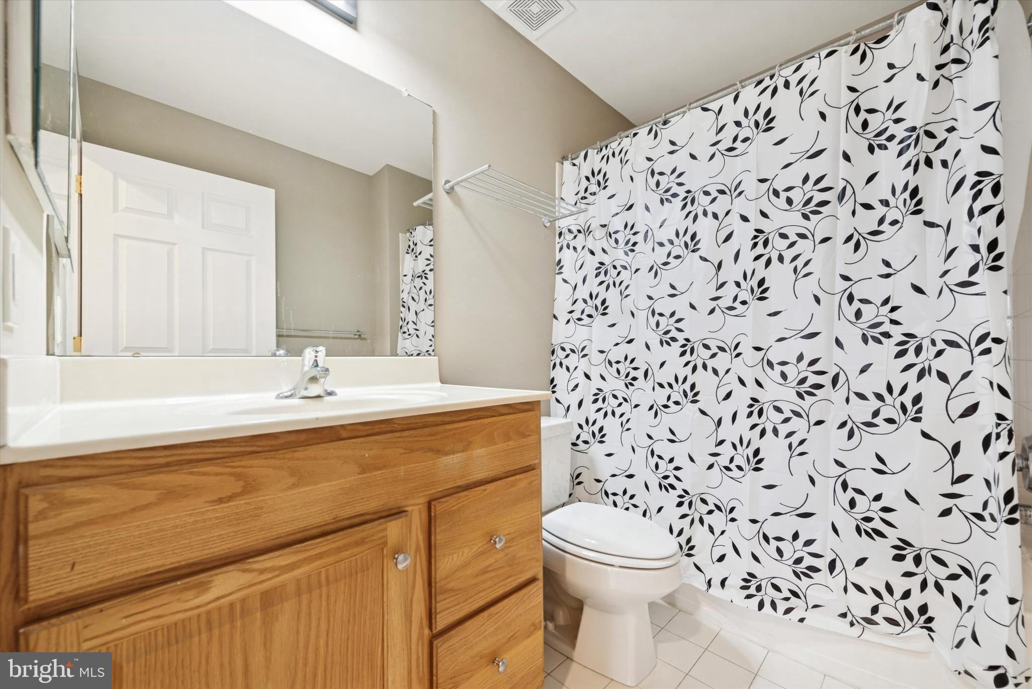 79 Granite Lane, Unit 2 Chester Springs, PA 19425 - Photo 6 of 15 a bathroom with a sink toilet and shower