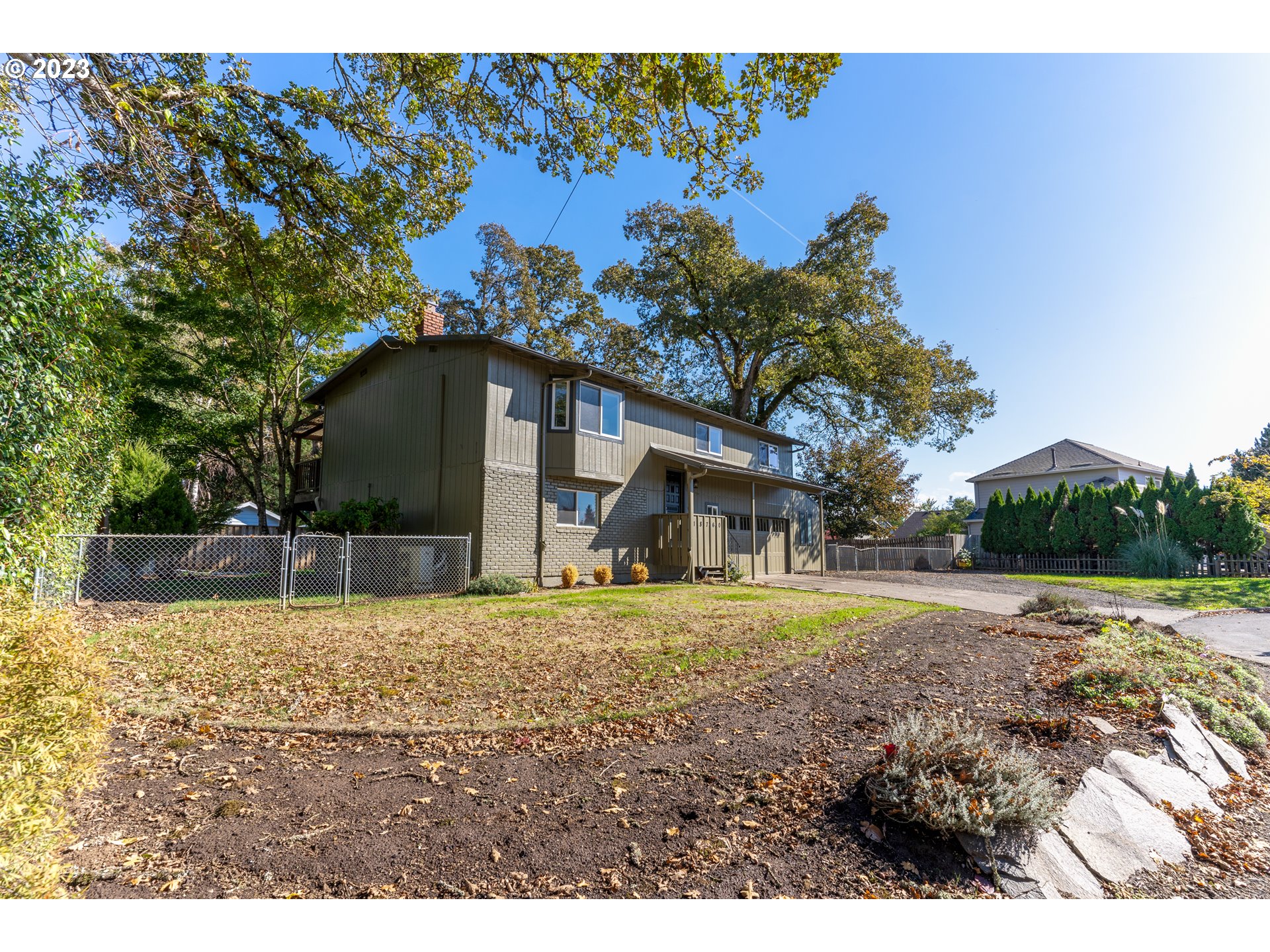18760 Cook Street Oregon City, OR 97045 - Photo 2 of 36 a house view with a outdoor space