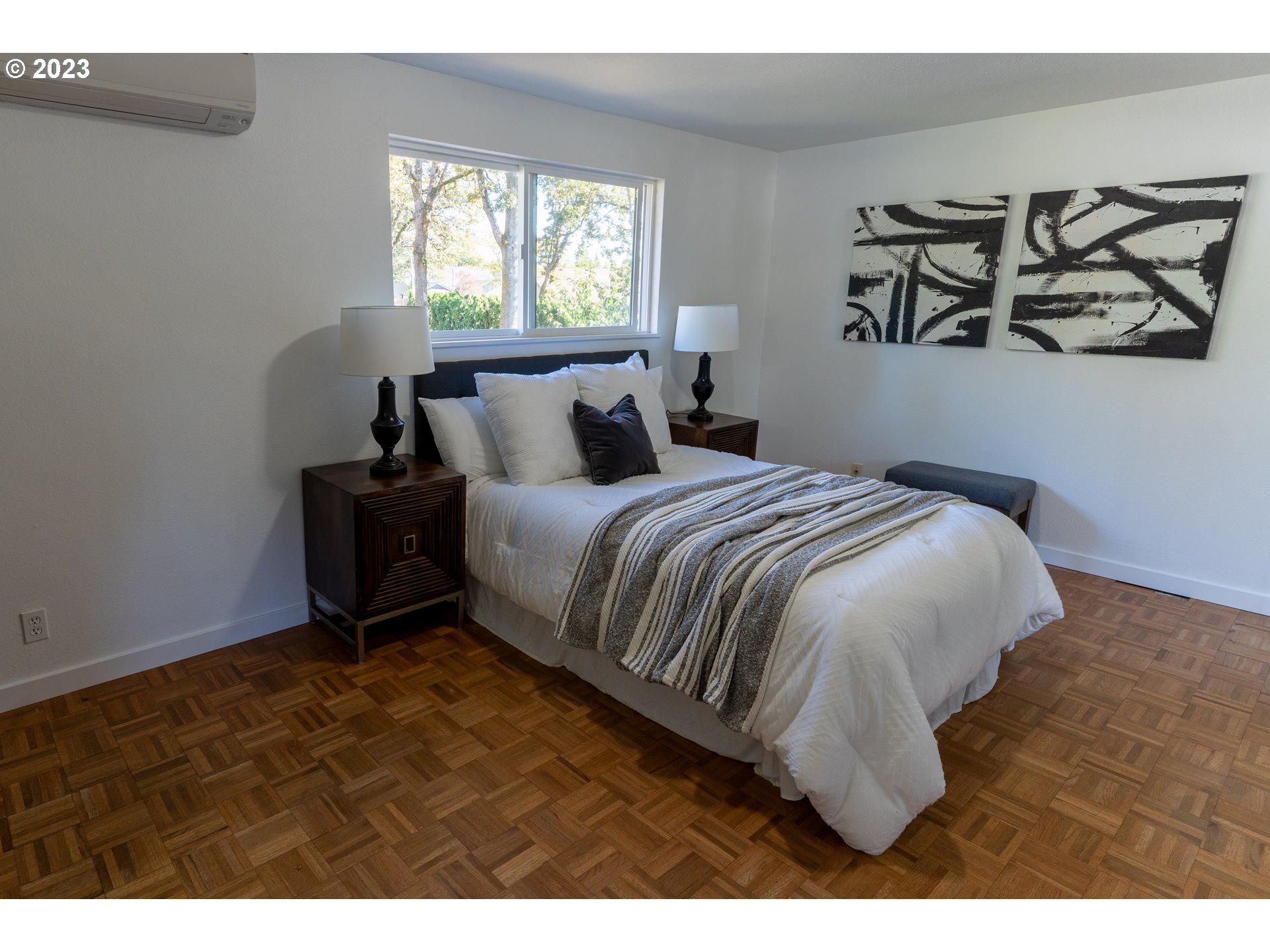 18760 Cook Street Oregon City, OR 97045 - Photo 22 of 36 a bedroom with a bed and painting on the wall