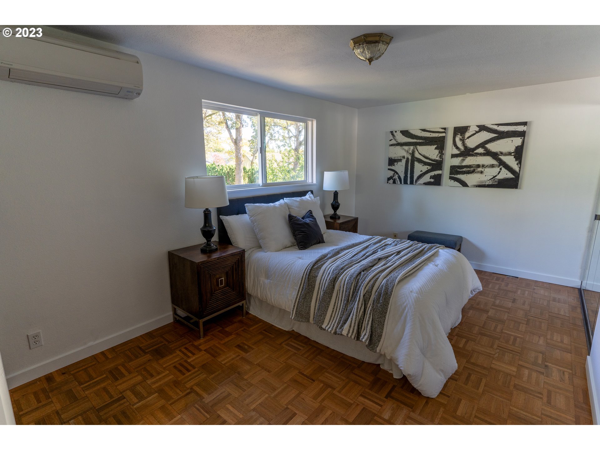 18760 Cook Street Oregon City, OR 97045 - Photo 23 of 36 a bedroom with a bed and a window