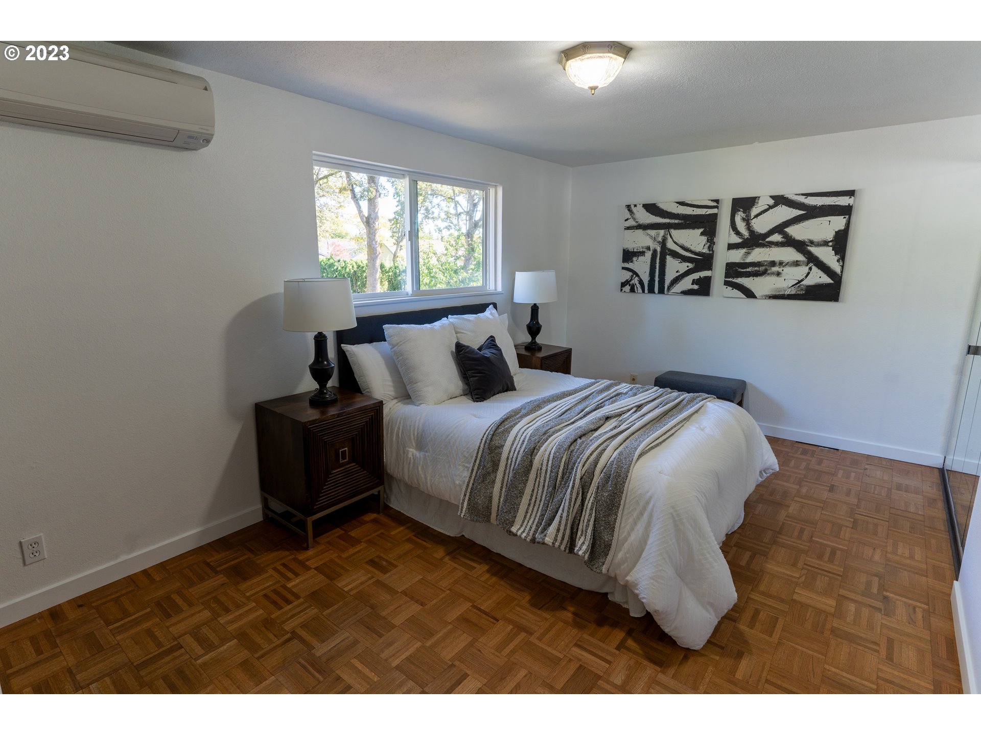 18760 Cook Street Oregon City, OR 97045 - Photo 24 of 36 a bedroom with a bed and a painting on the wall