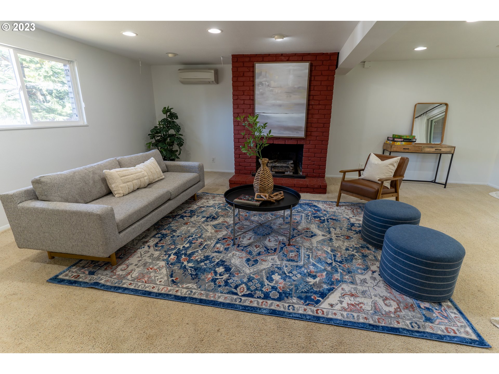 18760 Cook Street Oregon City, OR 97045 - Photo 29 of 36 a living room with furniture a couch and a potted plant