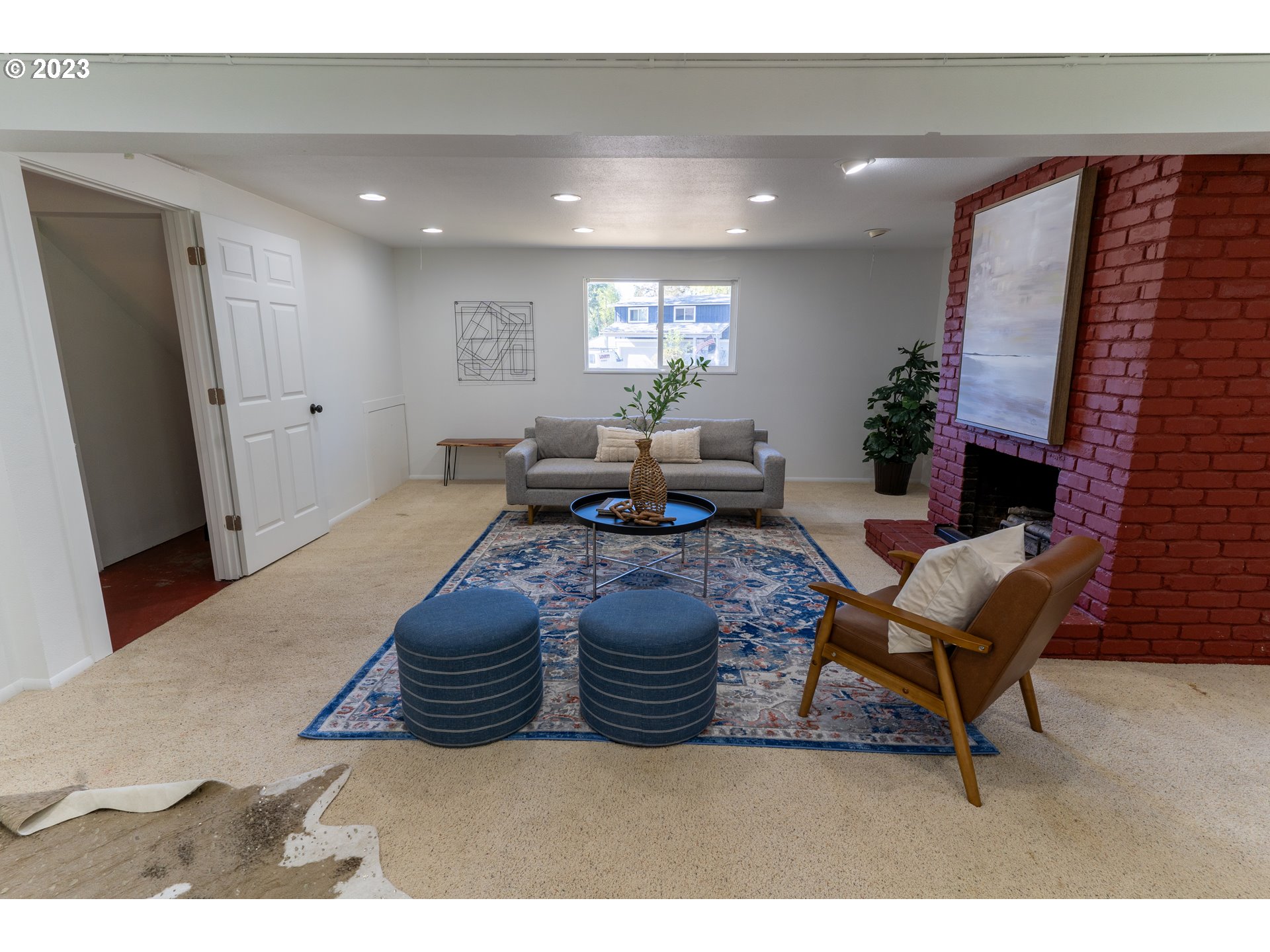 18760 Cook Street Oregon City, OR 97045 - Photo 31 of 36 a living room with furniture window and a flat screen tv