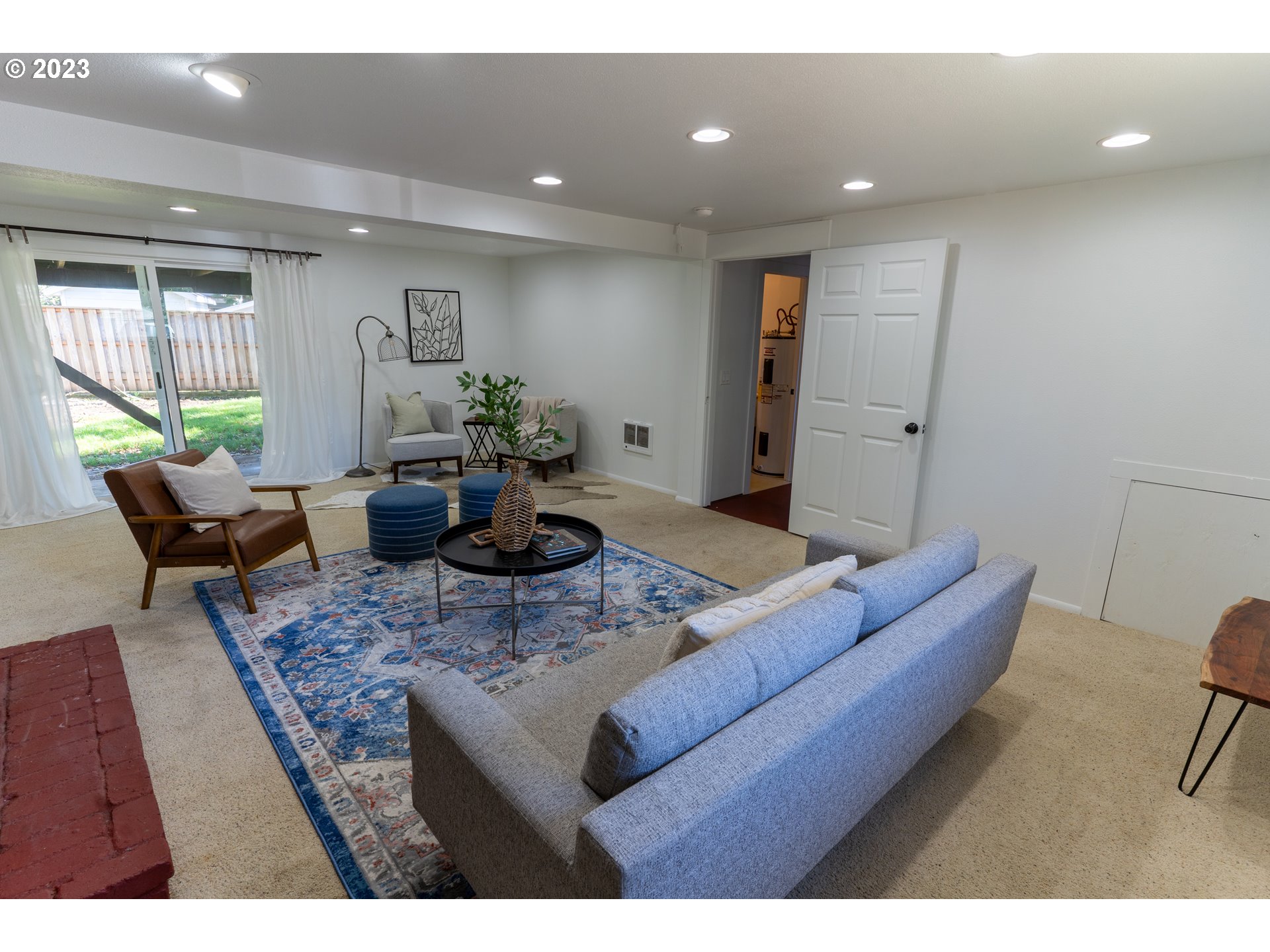 18760 Cook Street Oregon City, OR 97045 - Photo 33 of 36 a living room with furniture and a large window