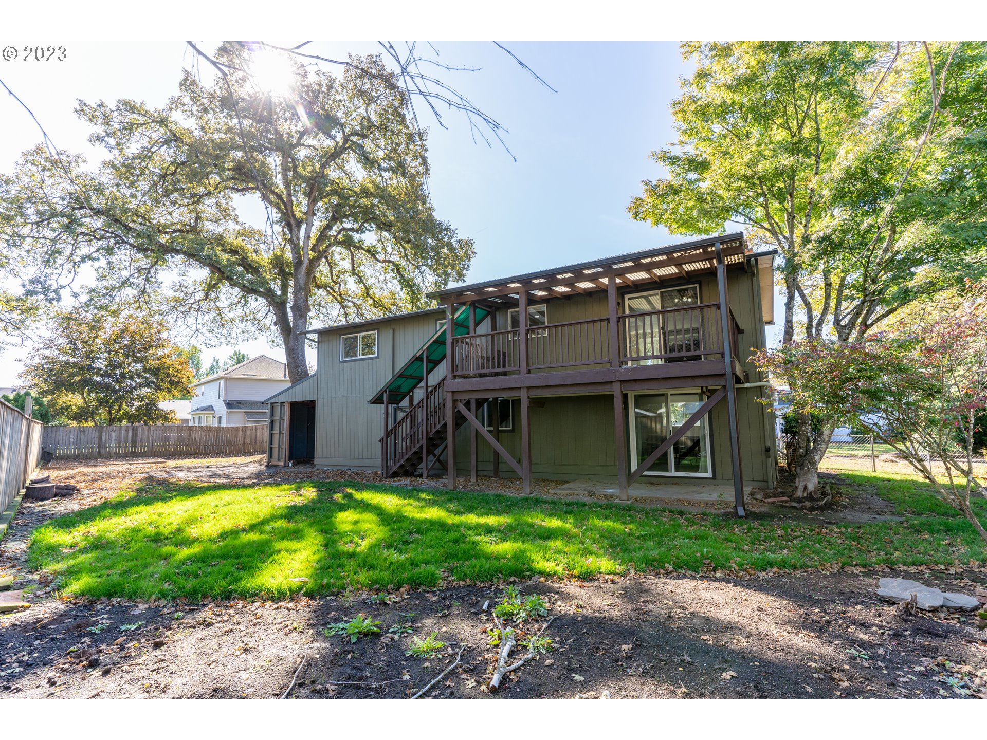 18760 Cook Street Oregon City, OR 97045 - Photo 35 of 36 a view of a house with a yard