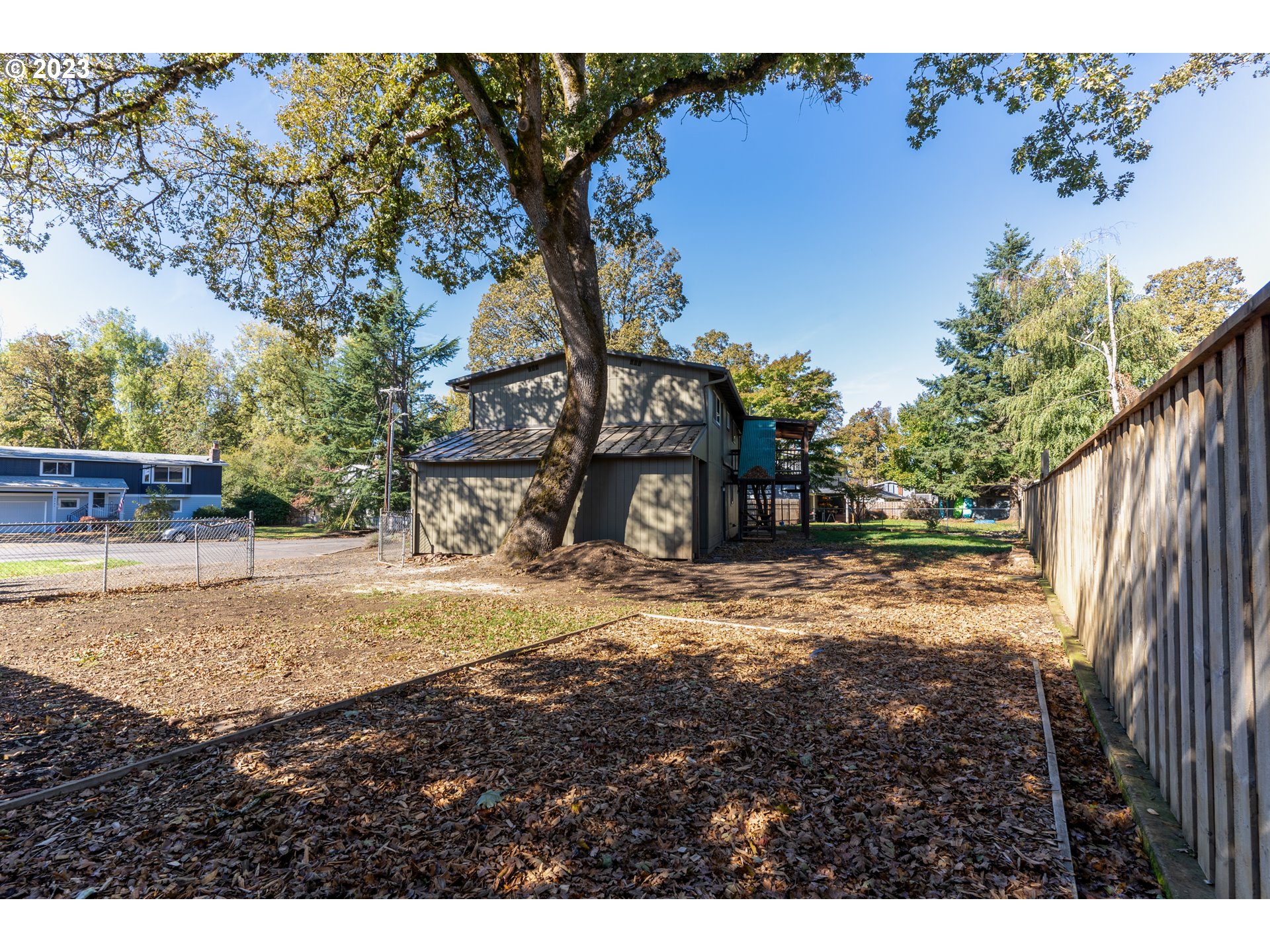 18760 Cook Street Oregon City, OR 97045 - Photo 36 of 36 a view of a yard with plants and trees