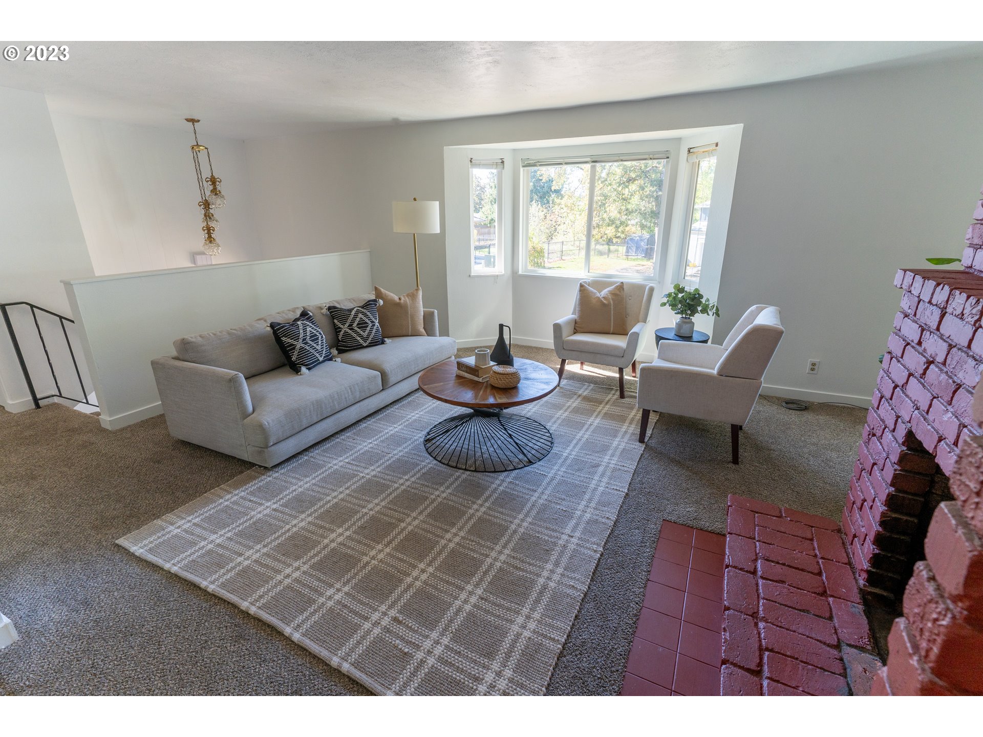 18760 Cook Street Oregon City, OR 97045 - Photo 7 of 36 a living room with furniture and a window