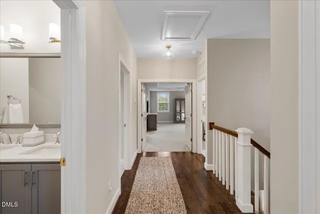a view of entryway with wooden floor and stairs
