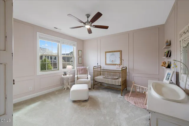 a bathroom with a sink vanity and shower