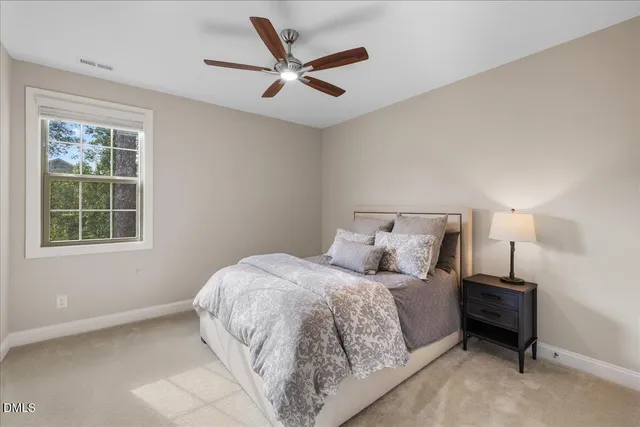 a white toilet sitting next to a bath tub