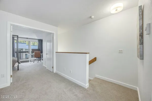 a view of hallway with livingroom and bedroom view