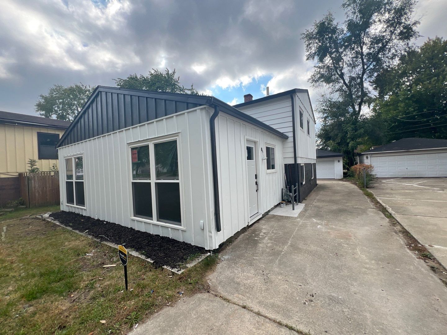 290 Merrill Avenue Calumet City, IL 60409 - Photo 2 of 18 a view of a house with a patio