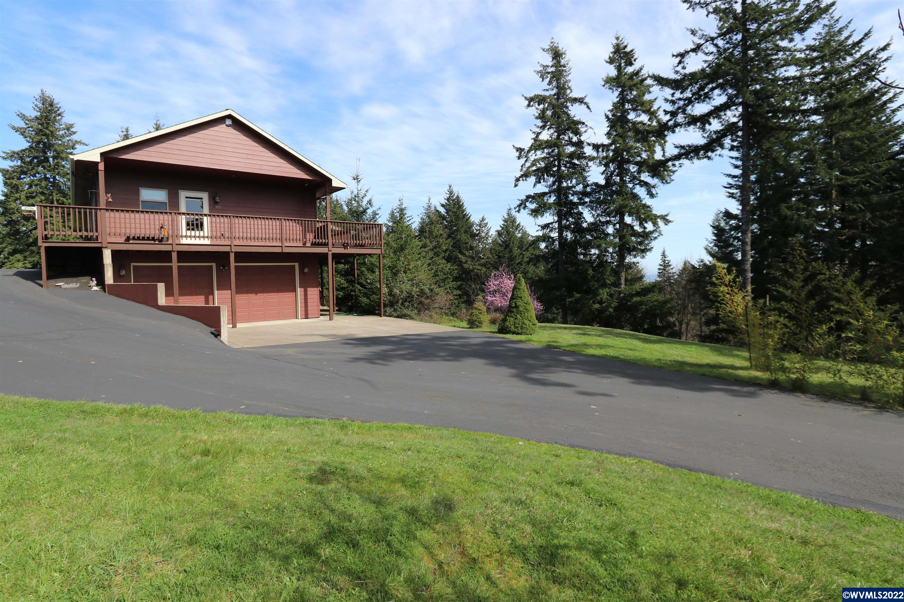 16955 Selden Road Dallas, OR 97338 - Photo 41 of 41 a front view of house with yard and trees in the background