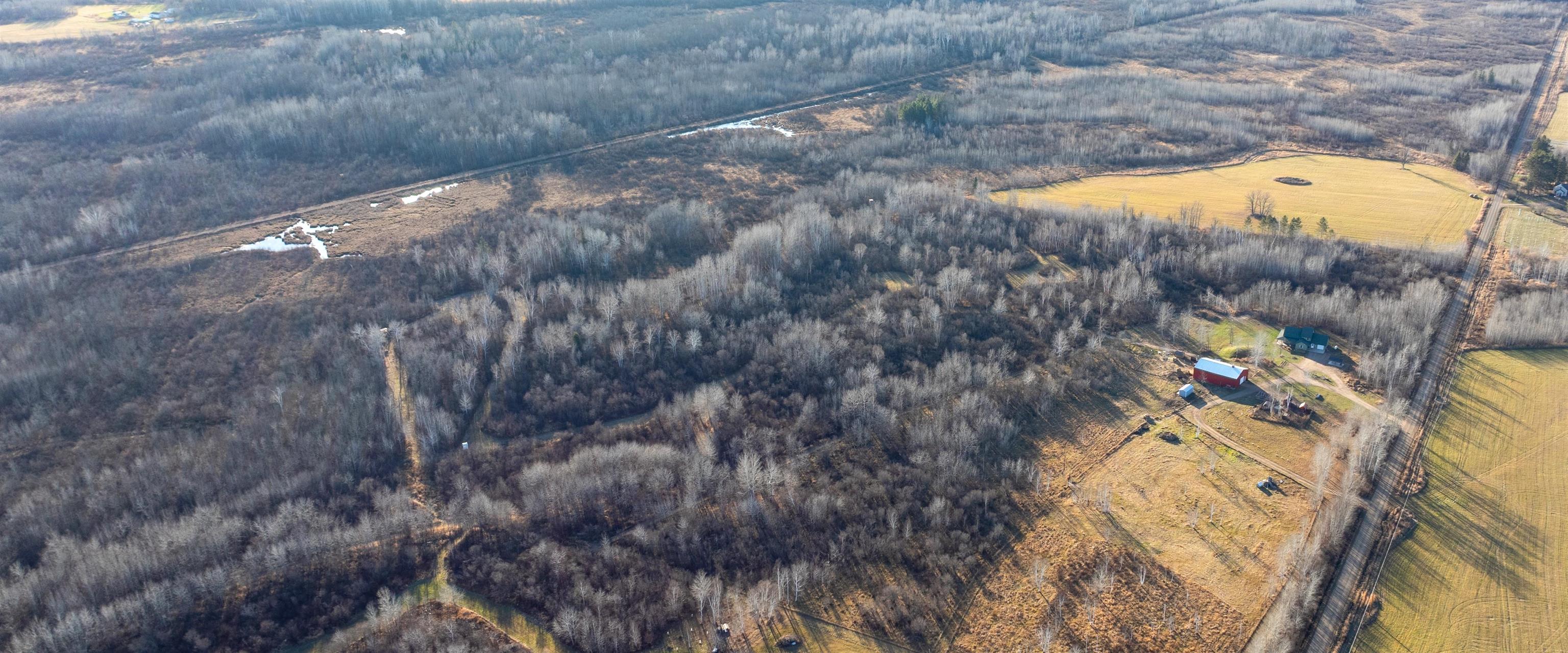 6014 Brown Road Kettle River, MN 55757 - Photo 39 of 54 Aerial overview of property's location with a forest