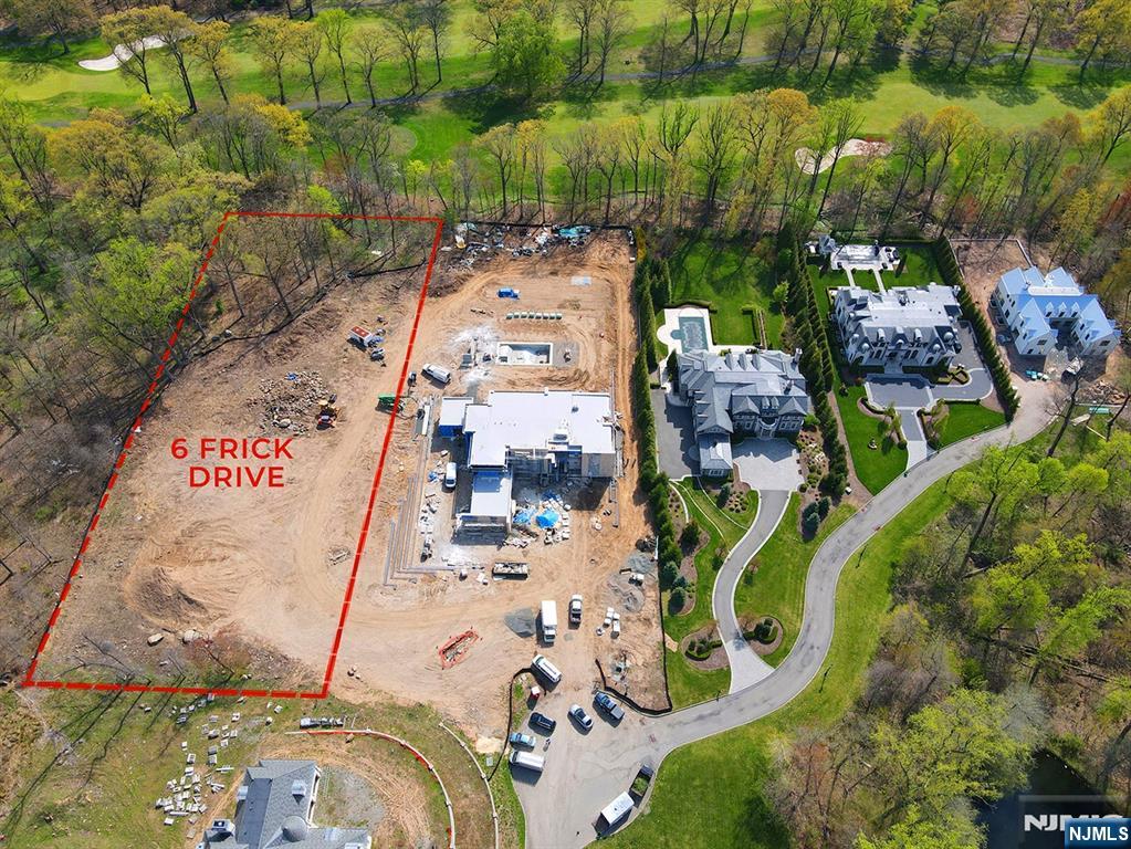 6 Frick Drive Demarest, NJ 07627 - Photo 3 of 8 an aerial view of a swimming pool
