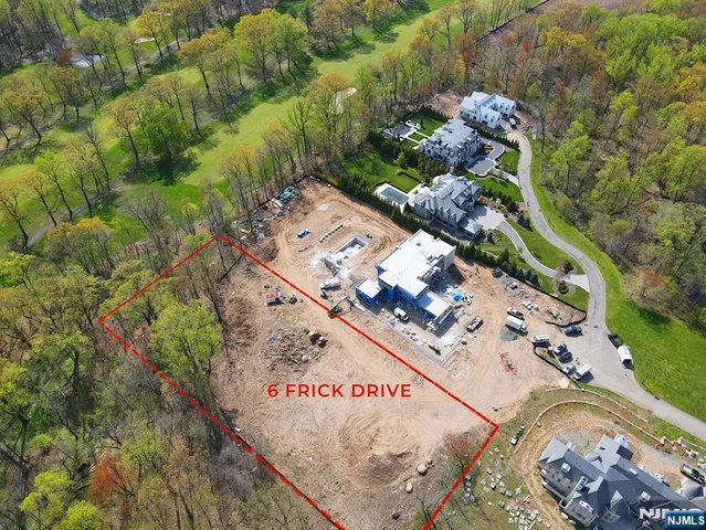 a view of a garden with an outdoor seating