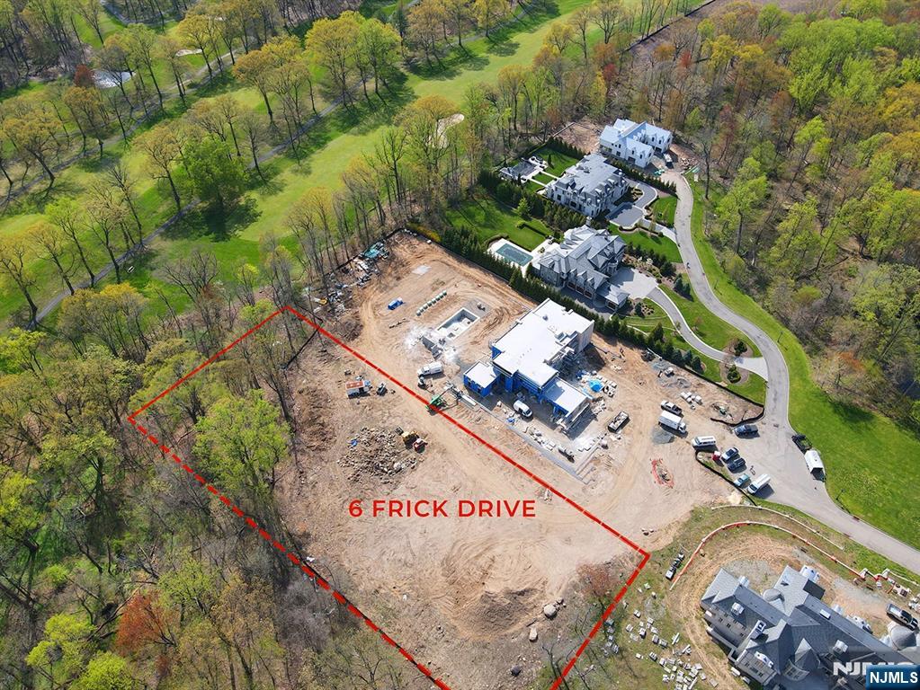 6 Frick Drive Demarest, NJ 07627 - Photo 4 of 8 a view of a garden with an outdoor seating