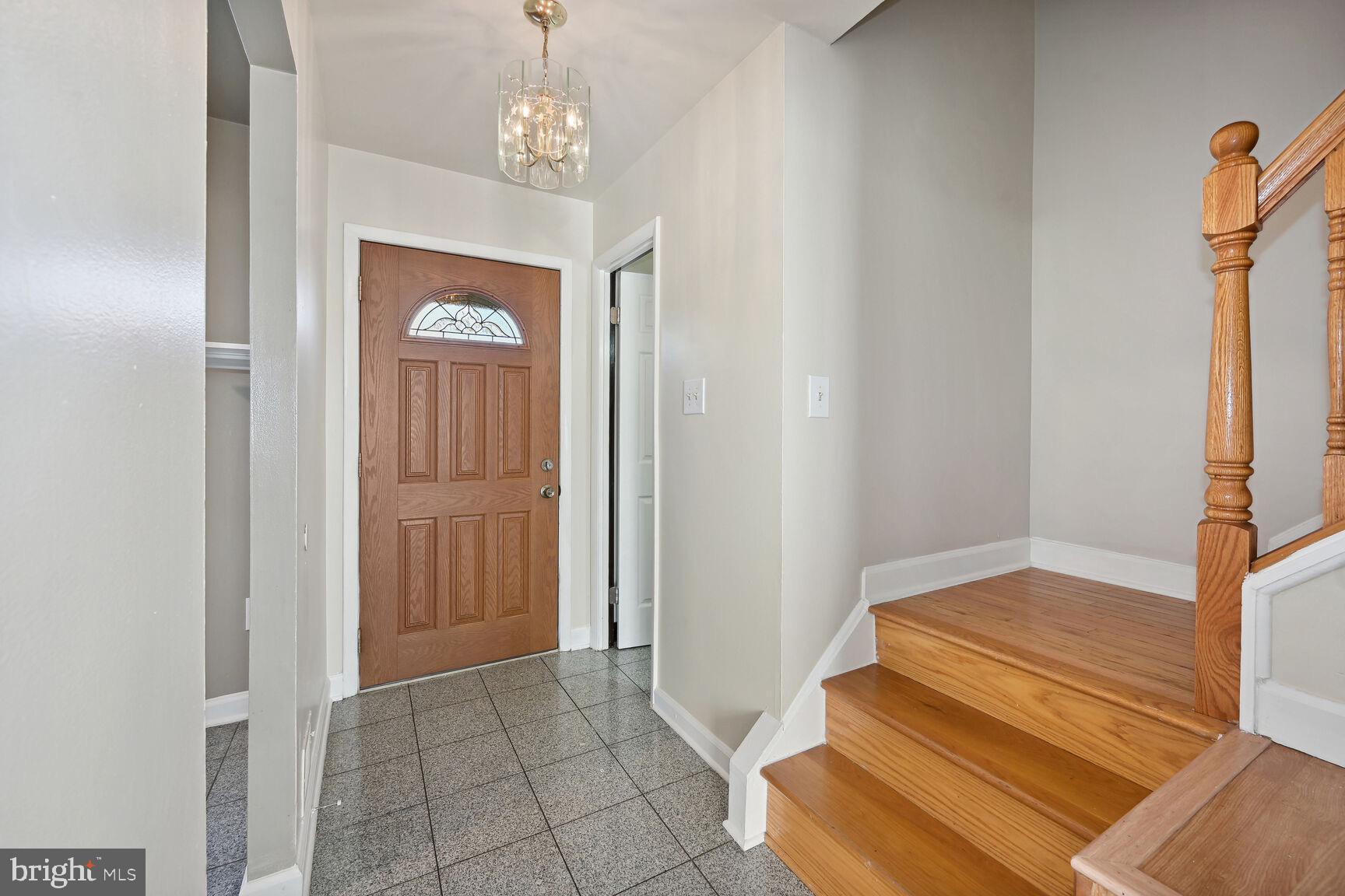 8324 Mountain Ash Way Gaithersburg, MD 20879 - Photo 12 of 36 Front hallway to upstairs level