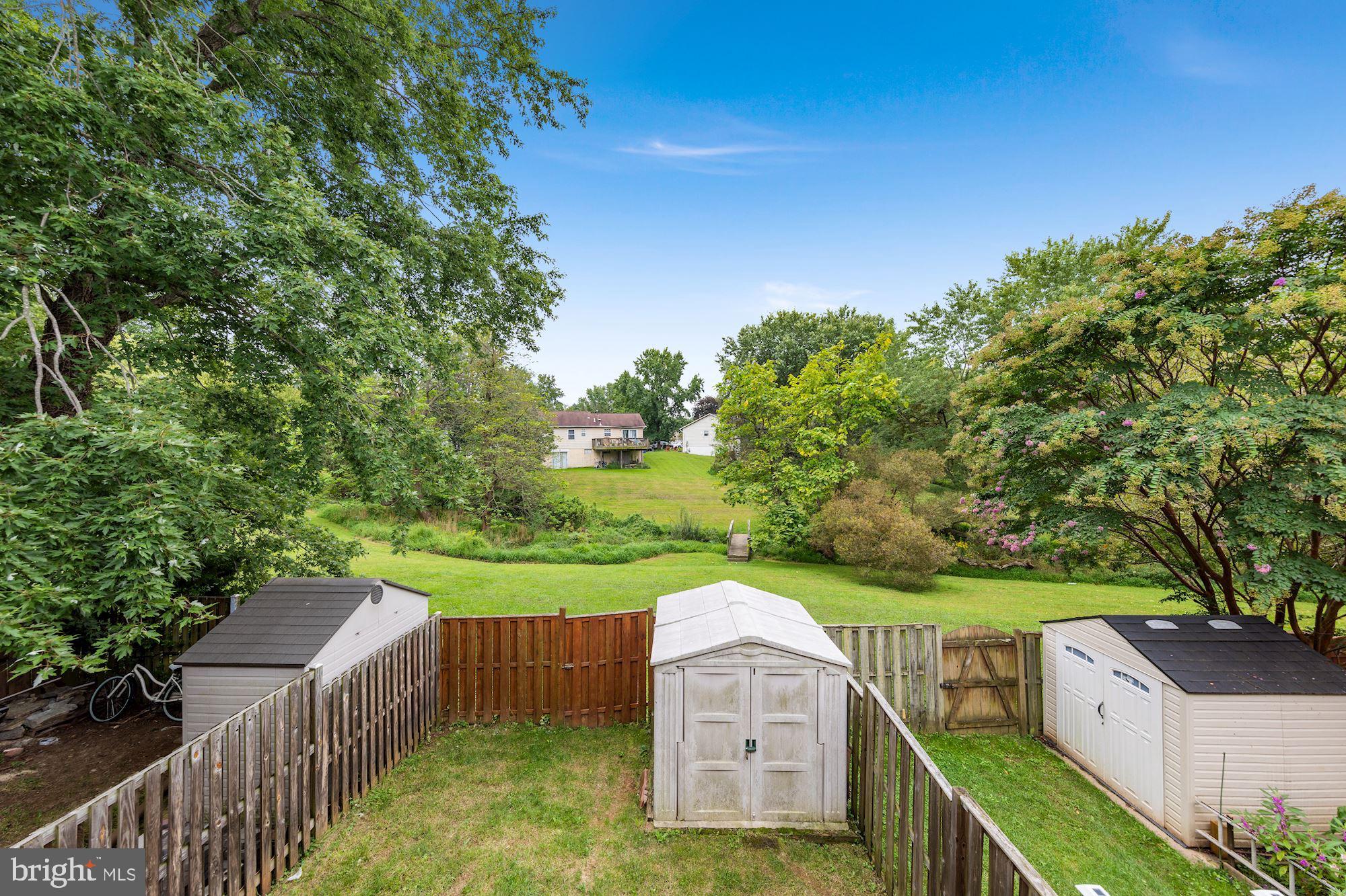 8324 Mountain Ash Way Gaithersburg, MD 20879 - Photo 31 of 36 Nice fenced backyard with storage shed