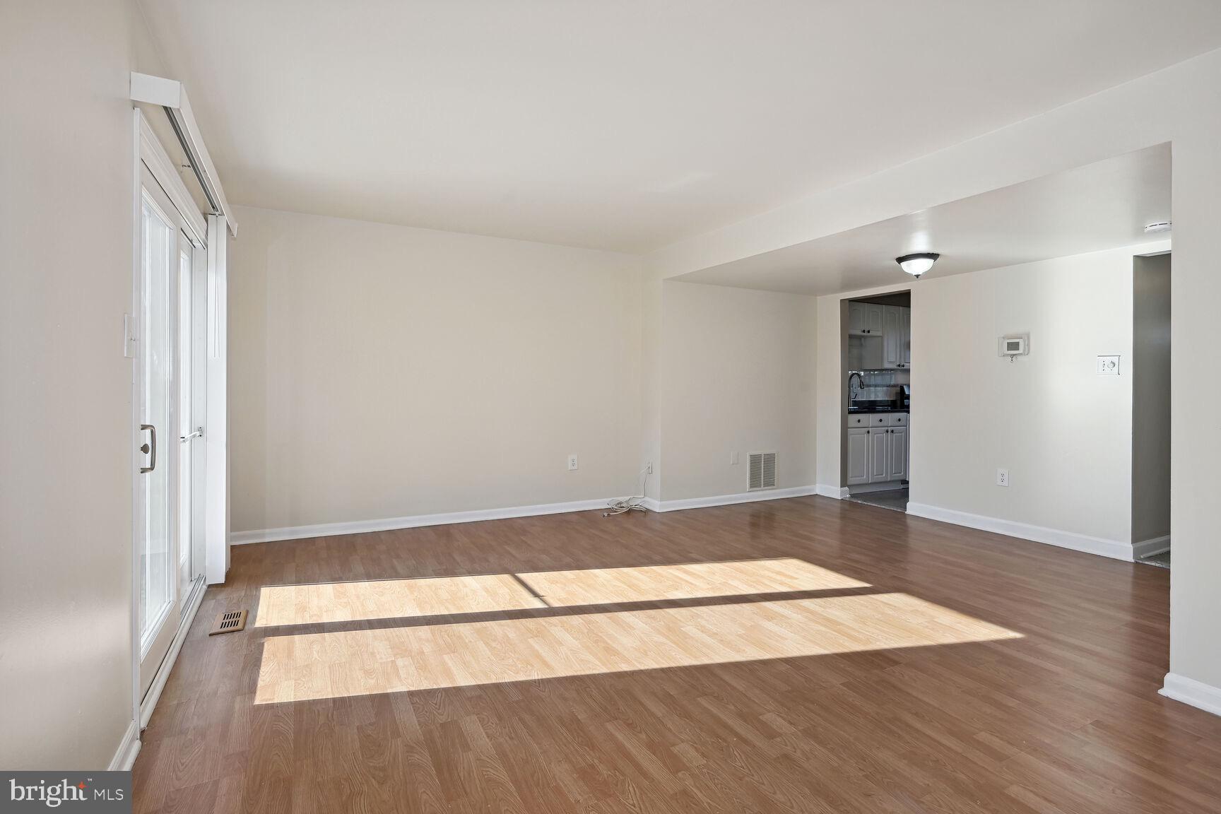 8324 Mountain Ash Way Gaithersburg, MD 20879 - Photo 9 of 36 Newer Sliding door to backyard deck on main level