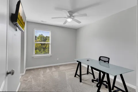 a bathroom with a sink mirror toilet and shower