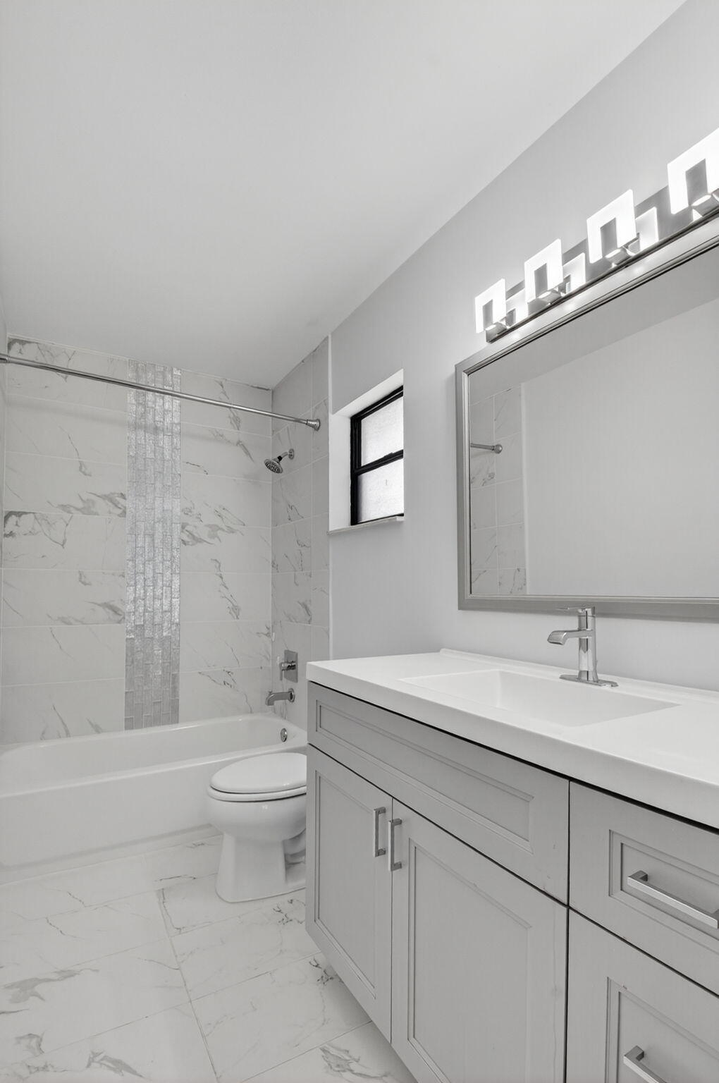 4135 Bay Laurel Way Boca Raton, FL 33487 - Photo 33 of 52 a bathroom with a sink a toilet and shower