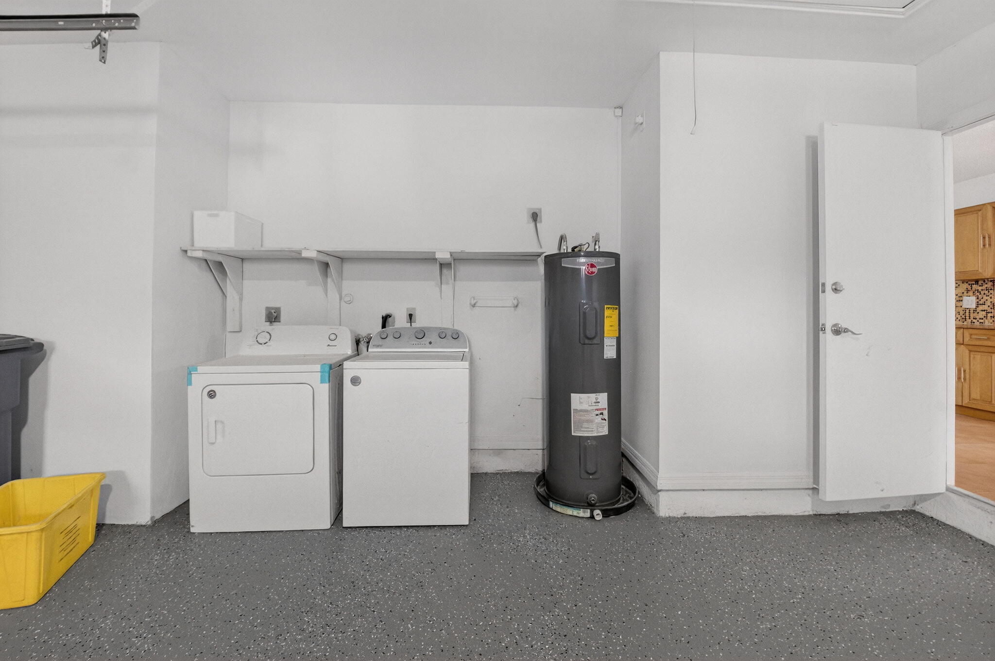 4135 Bay Laurel Way Boca Raton, FL 33487 - Photo 34 of 52 a view of storage and utility room with washer and dryer