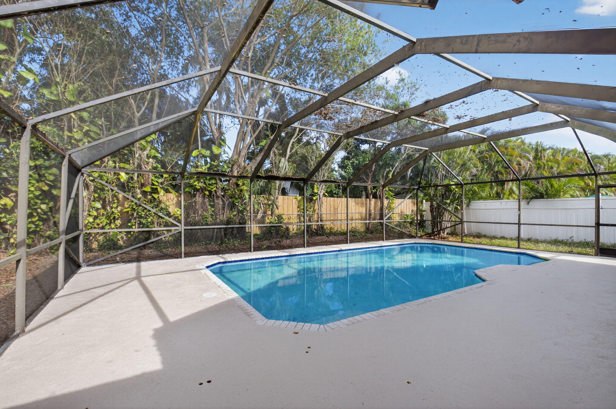 4135 Bay Laurel Way Boca Raton, FL 33487 - Photo 37 of 52 a view of a backyard with a swimming pool