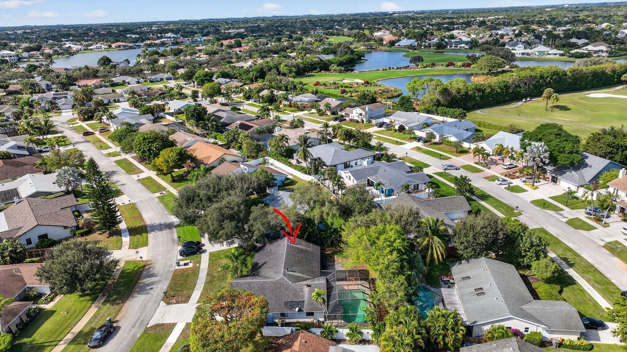 4135 Bay Laurel Way Boca Raton, FL 33487 - Photo 48 of 52 an aerial view of a city with lots of residential buildings