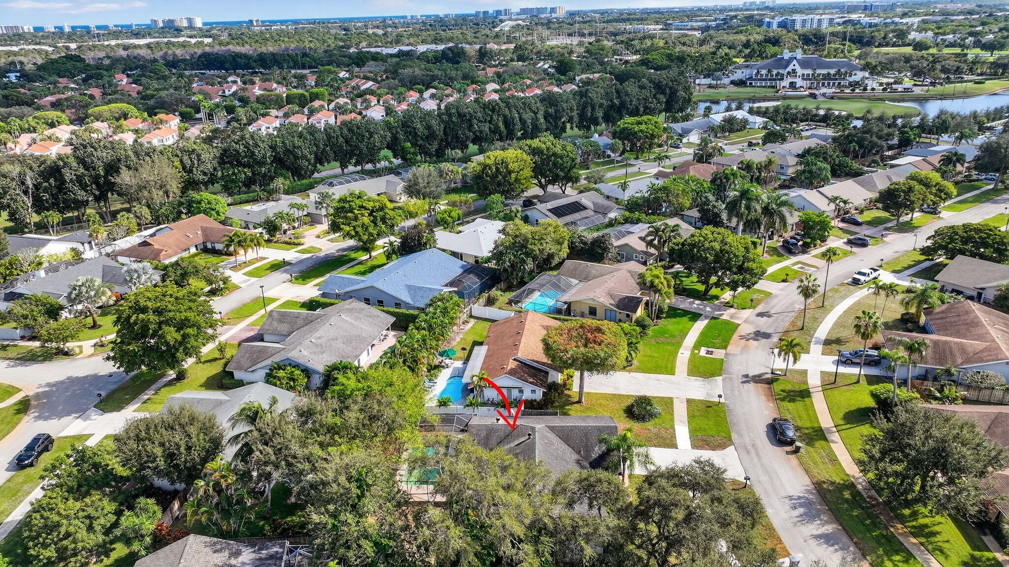 4135 Bay Laurel Way Boca Raton, FL 33487 - Photo 51 of 52 an aerial view of residential houses with outdoor space and trees