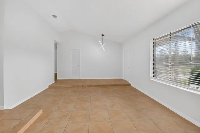 a view of a room with an empty space