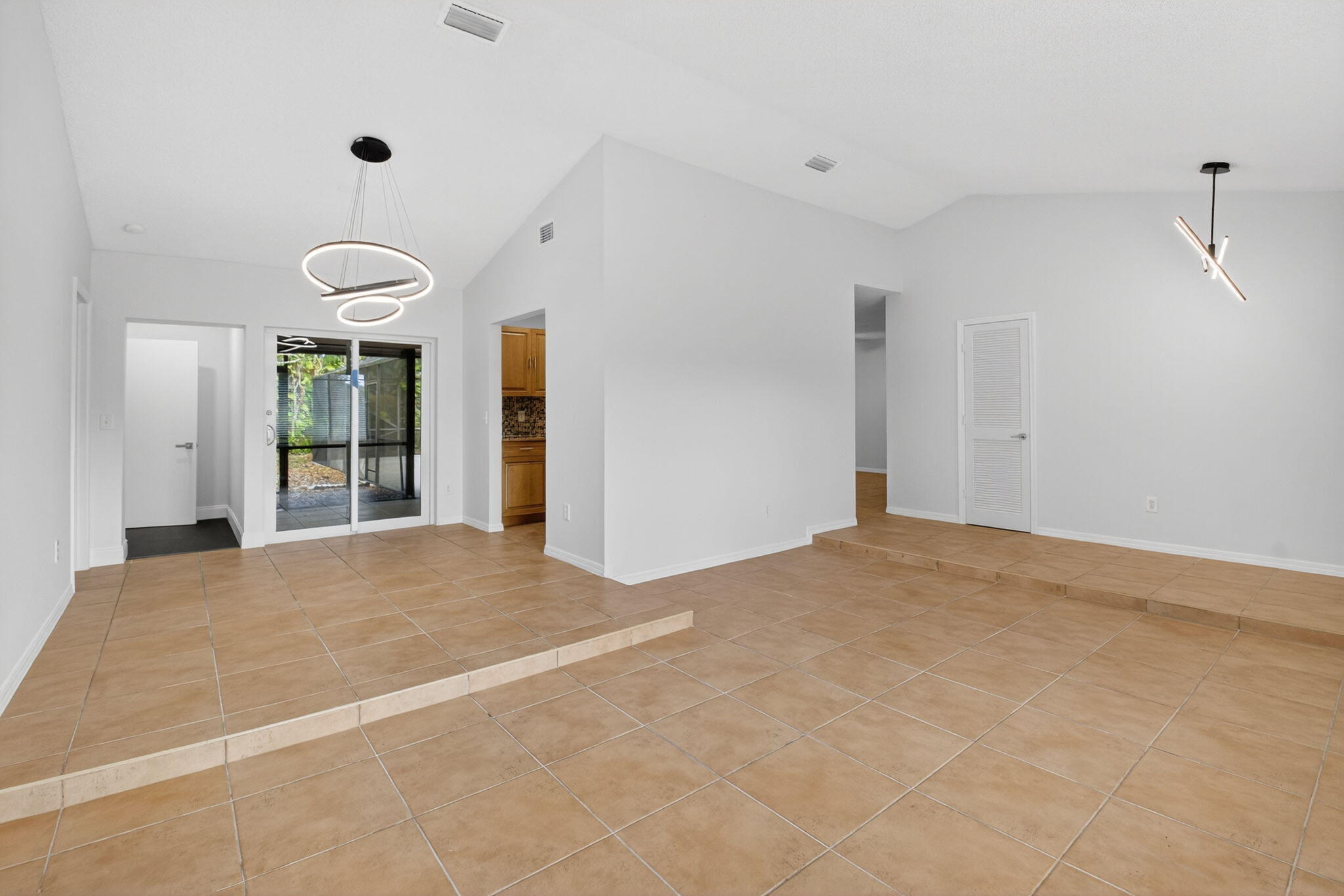 4135 Bay Laurel Way Boca Raton, FL 33487 - Photo 9 of 52 a view of empty room with windows