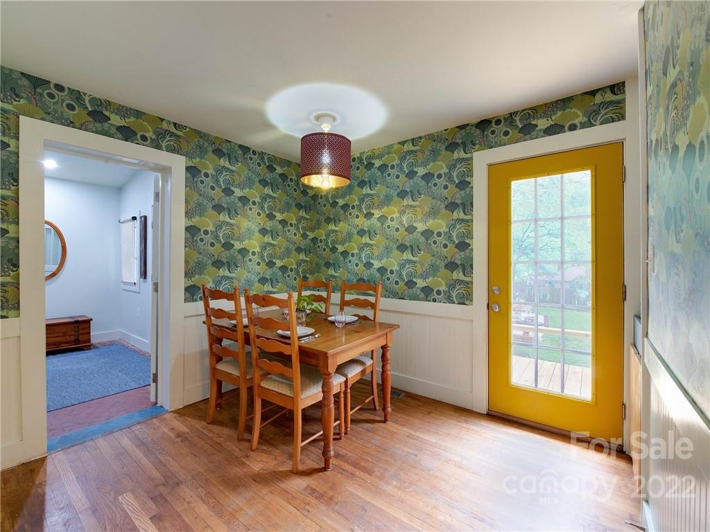 3501 Mathis Drive Charlotte, NC 28208 - Photo 14 of 42 a dining room with furniture and wooden floor