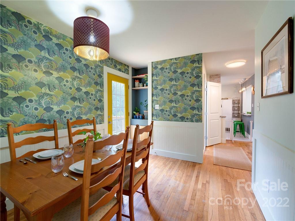 3501 Mathis Drive Charlotte, NC 28208 - Photo 15 of 42 a view of a dining room with furniture window and wooden floor