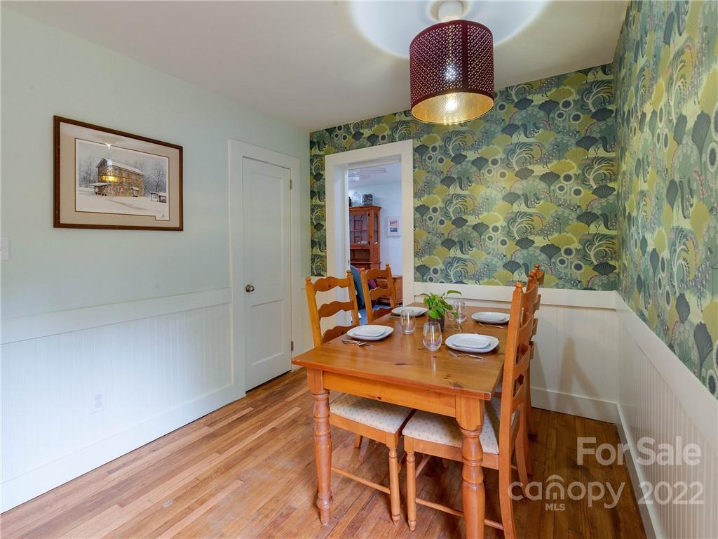 3501 Mathis Drive Charlotte, NC 28208 - Photo 16 of 42 a dining room with furniture and wooden floor