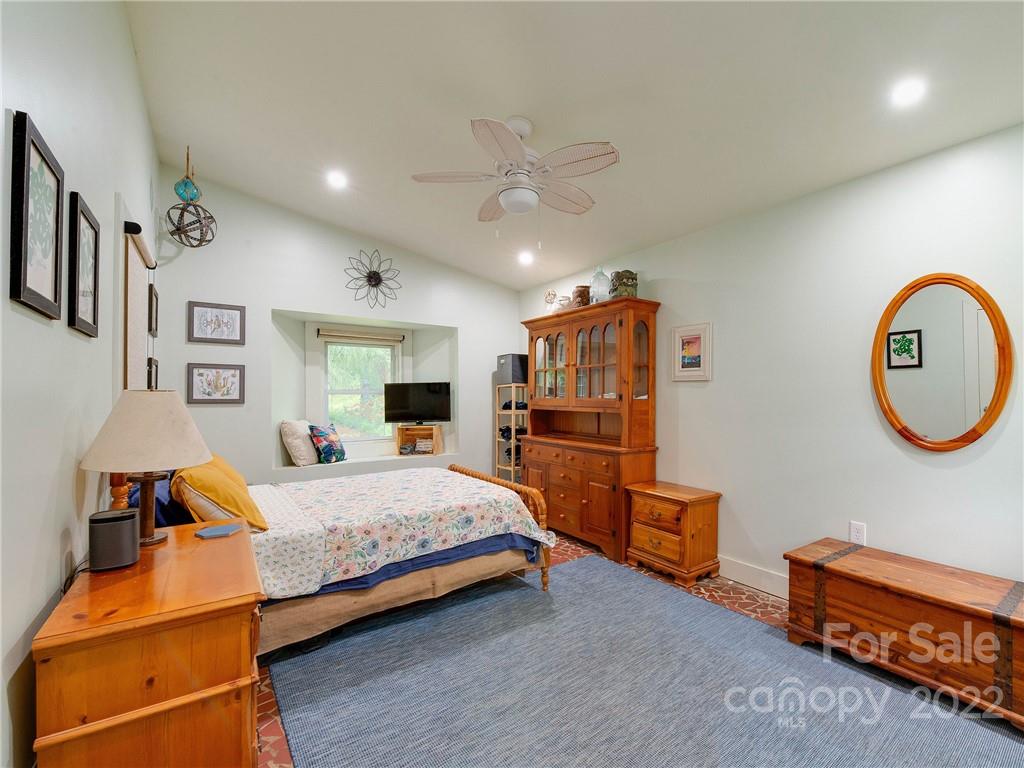 3501 Mathis Drive Charlotte, NC 28208 - Photo 18 of 42 a bedroom with bed and a chandelier