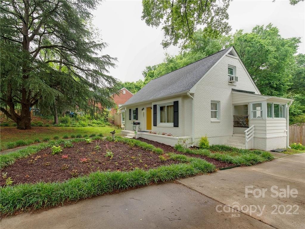 3501 Mathis Drive Charlotte, NC 28208 - Photo 2 of 42 a front view of a house with a garden