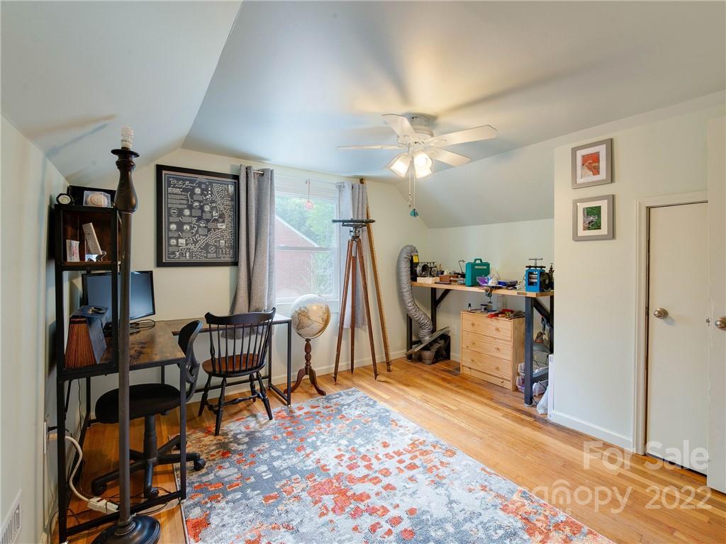3501 Mathis Drive Charlotte, NC 28208 - Photo 25 of 42 a living room with furniture and a flat screen tv