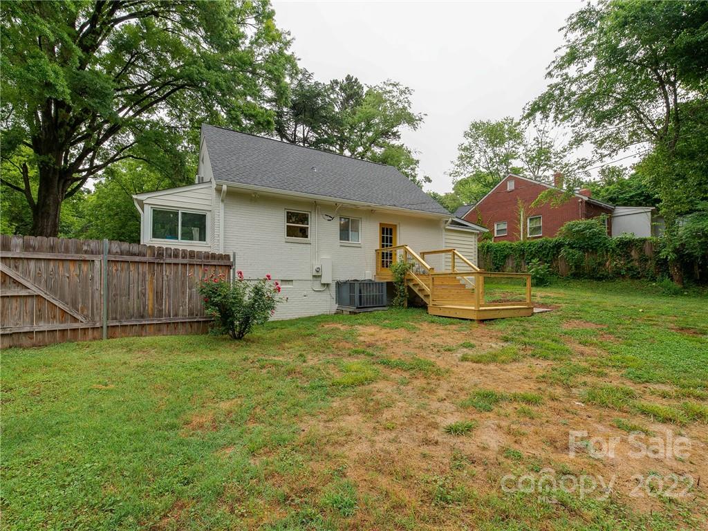 3501 Mathis Drive Charlotte, NC 28208 - Photo 31 of 42 a view of a house with backyard and a tree