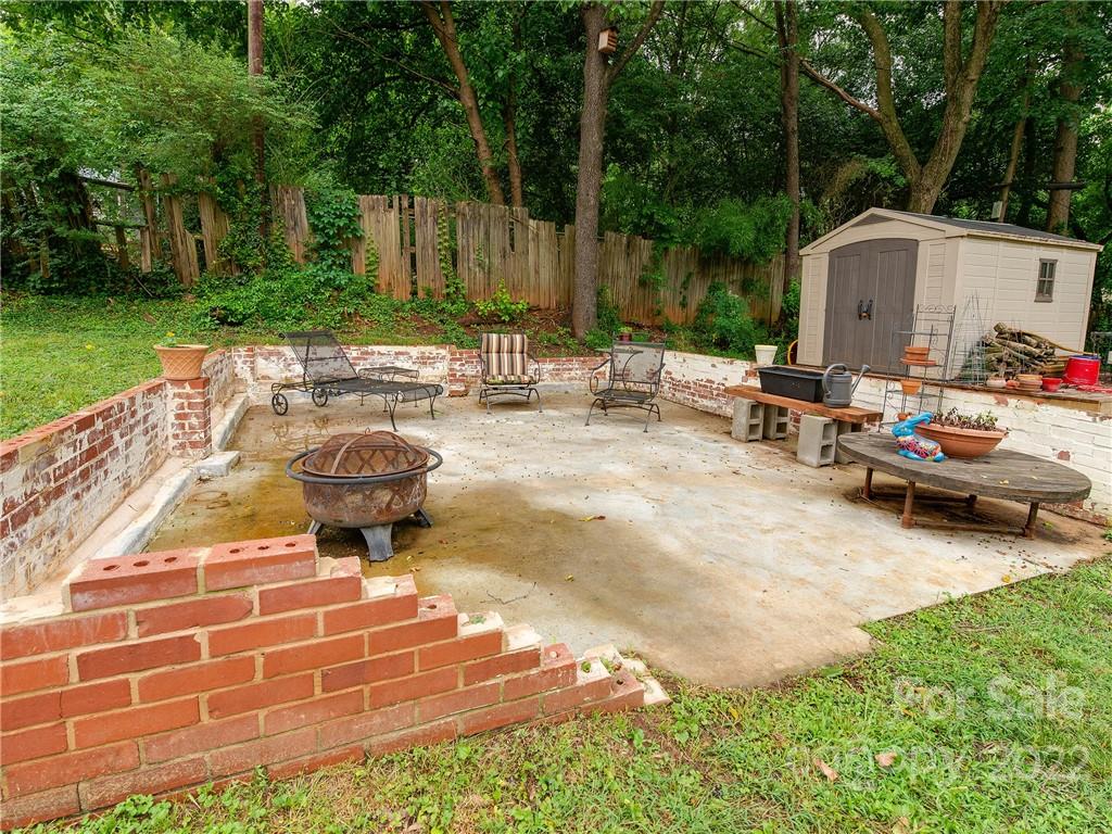 3501 Mathis Drive Charlotte, NC 28208 - Photo 33 of 42 a swimming pool with outdoor seating and yard