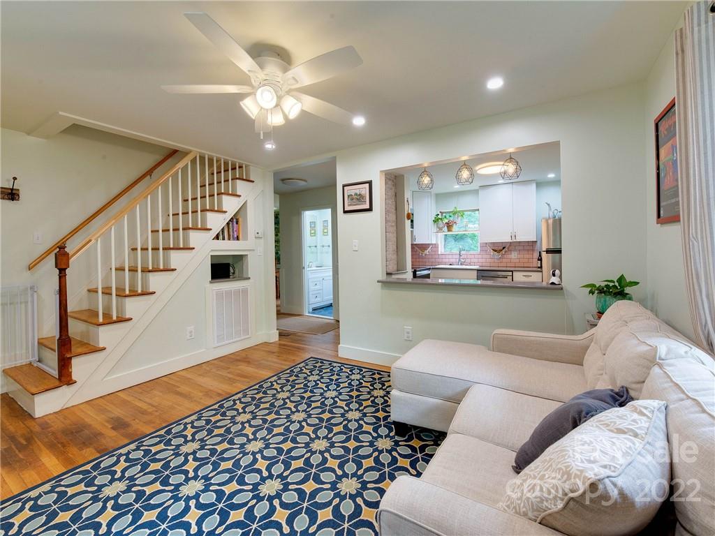 3501 Mathis Drive Charlotte, NC 28208 - Photo 4 of 42 a living room with furniture and a chandelier