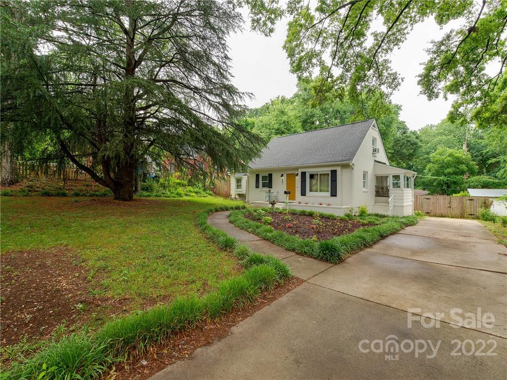 3501 Mathis Drive Charlotte, NC 28208 - Photo 41 of 42 a front view of a house with a garden