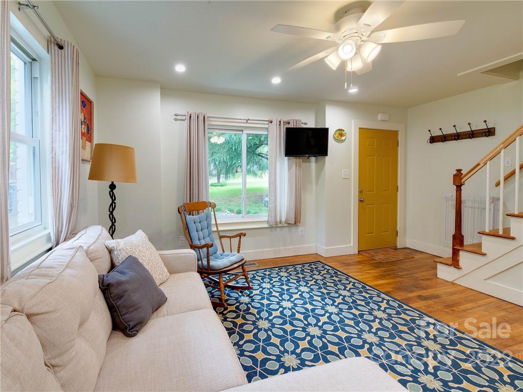3501 Mathis Drive Charlotte, NC 28208 - Photo 5 of 42 a bedroom with a bed and a chandelier