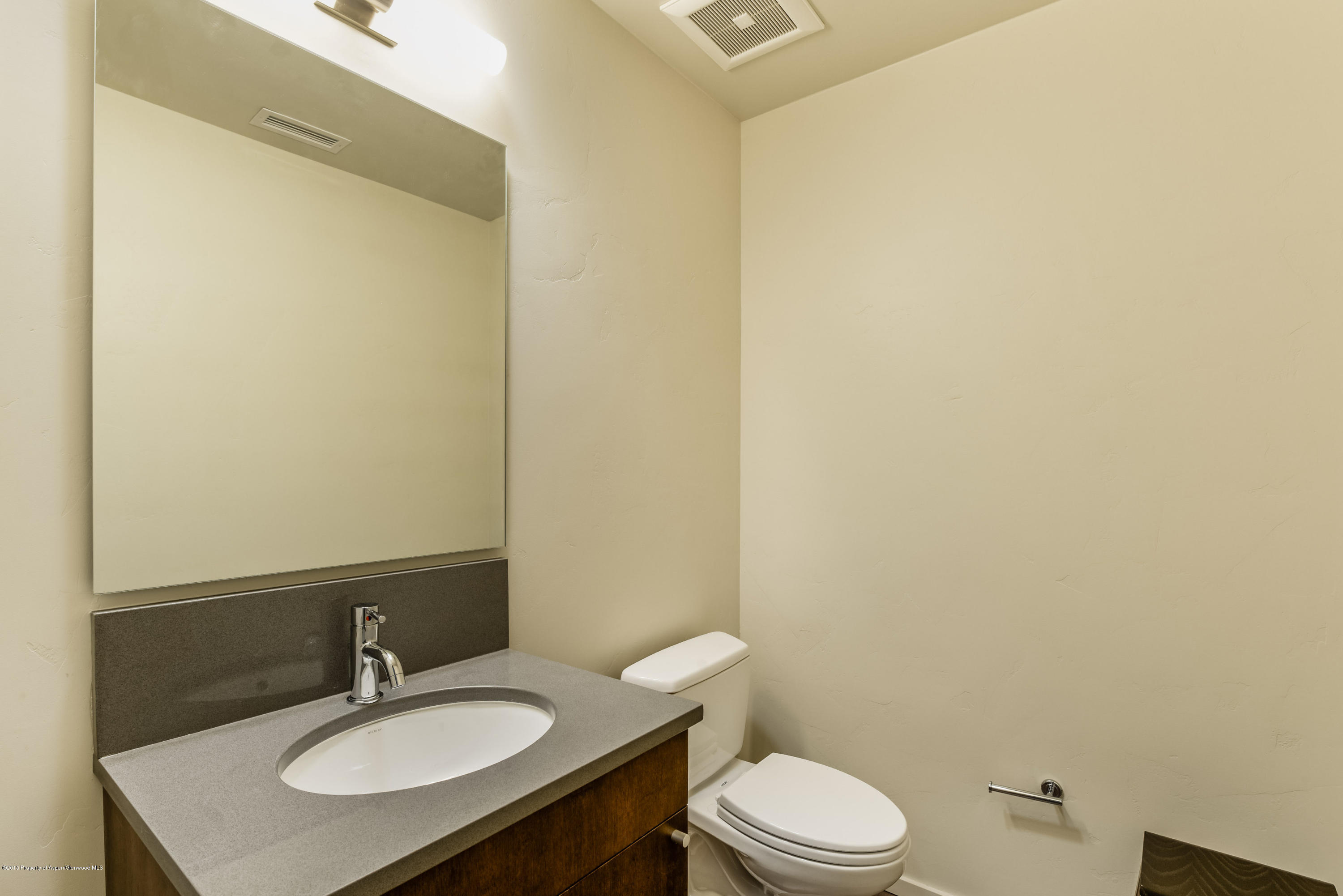 200 Evans Road, Unit 103 Basalt, CO 81621 - Photo 12 of 26 a bathroom with a sink toilet and mirror