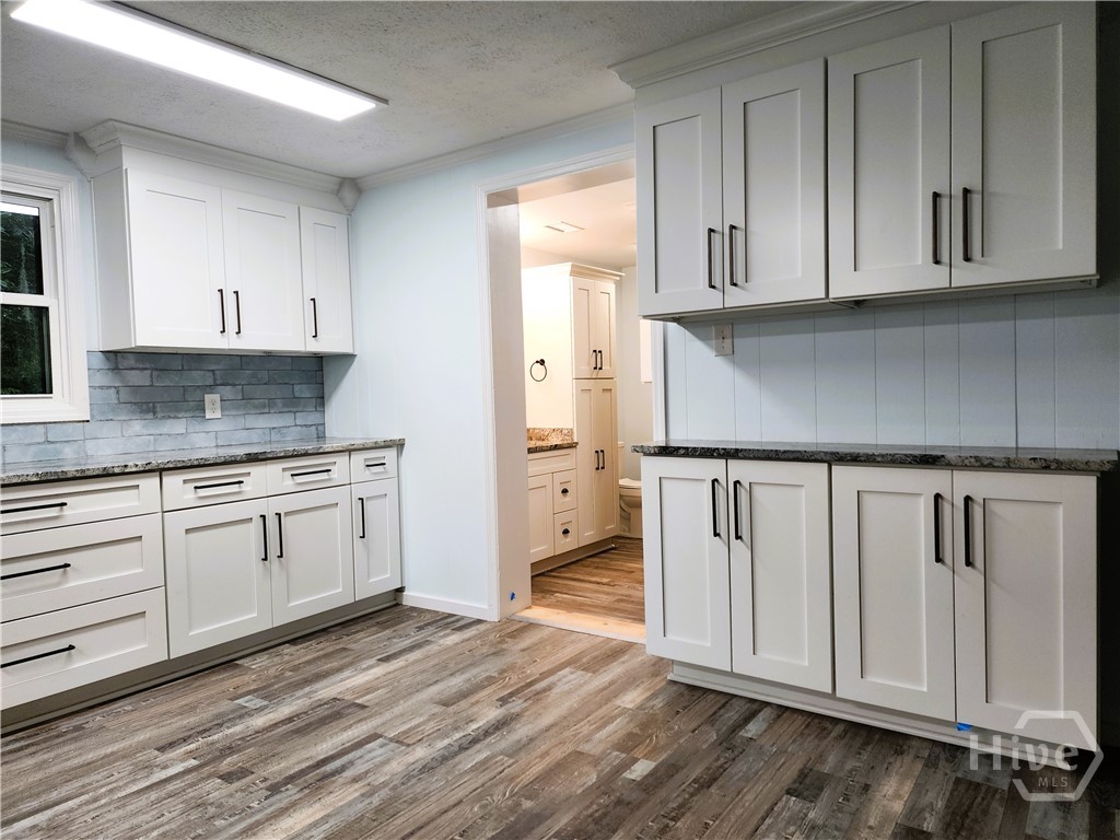 8708 Clark Avenue Savannah, GA 31406 - Photo 4 of 16 Kitchen and Master suite entrance